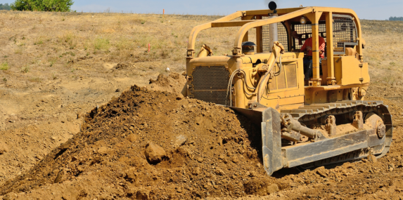 bulldozer picking up fill dirt