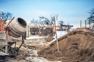 sand in construction with machine