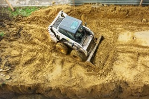 machine working on fill dirt