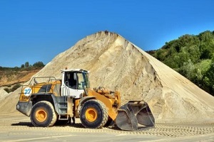 big machine with Florida sand in background