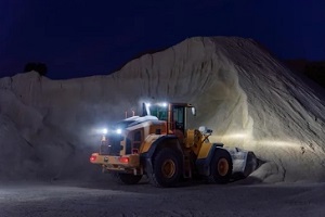 big machine with sand pile