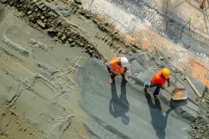 two workers preparing construction sites