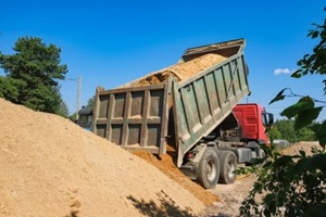 truck unloading construction sand