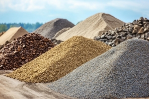 Large Piles of Sand, Fill Dirt, and Aggregates at Construction Site